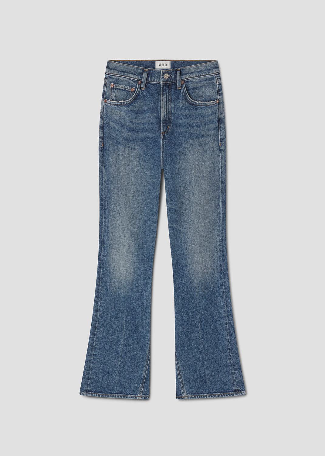 Blue jeans on a light gray background