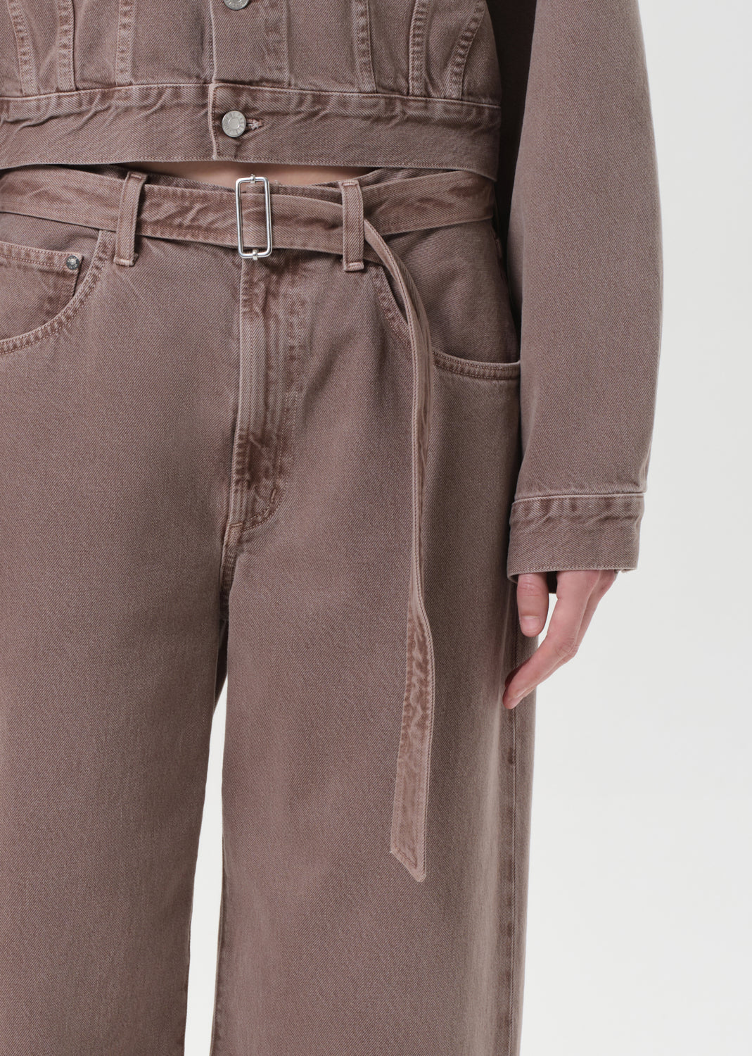 Brown jacket and pants with a belt on a white background