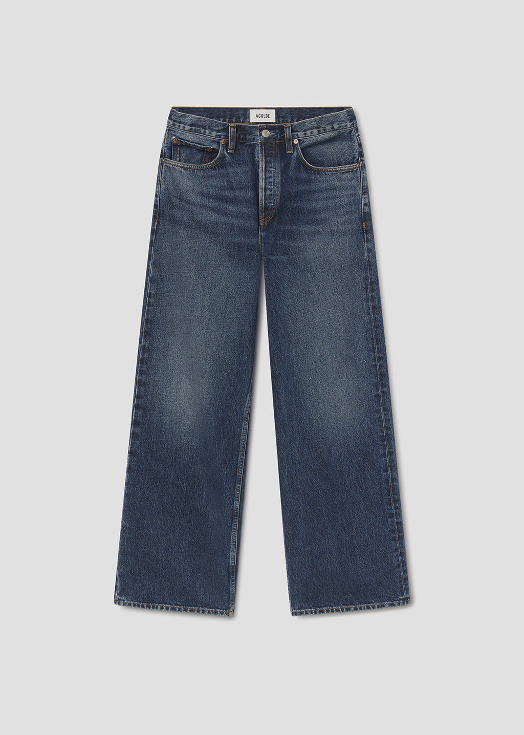 Pair of blue jeans on a light gray background