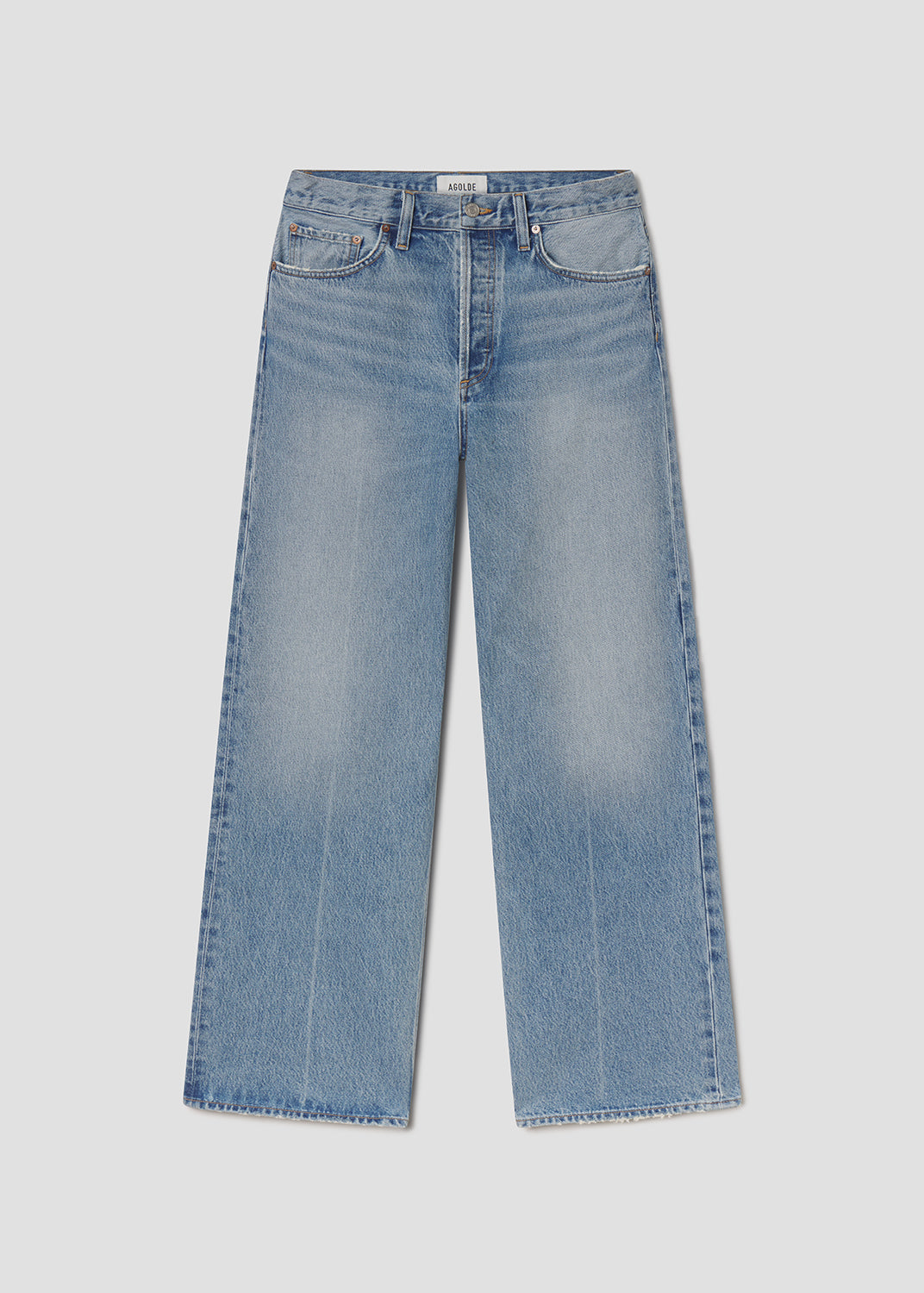 Blue jeans on a light gray background