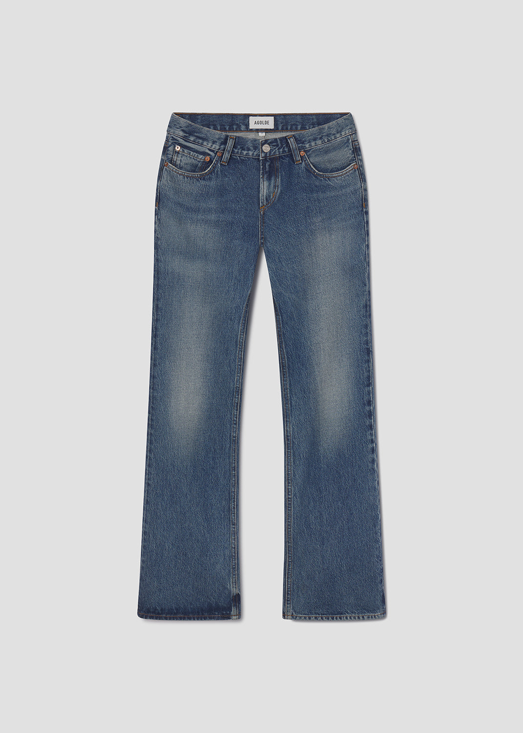 Blue jeans on a light gray background