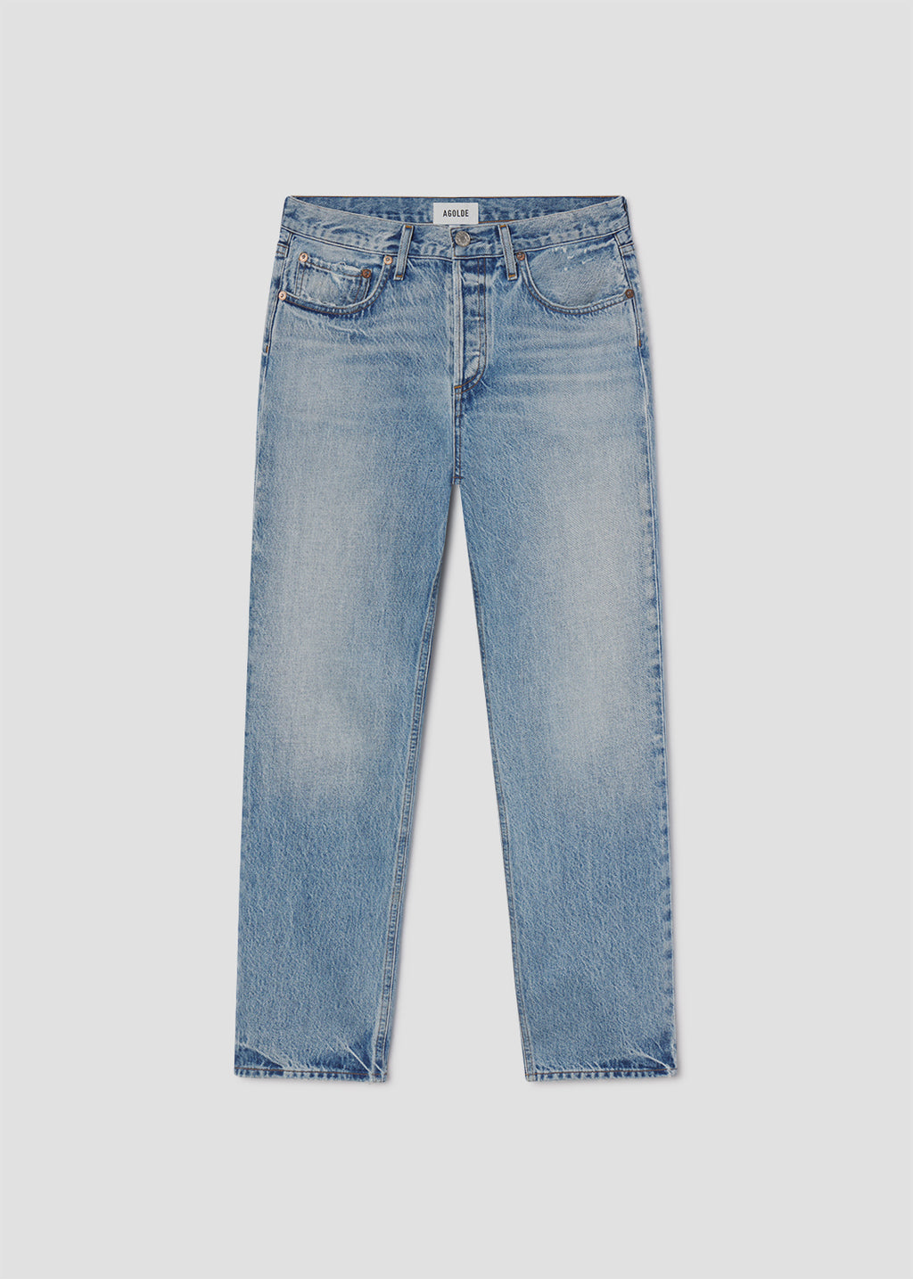 Blue jeans on a light gray background