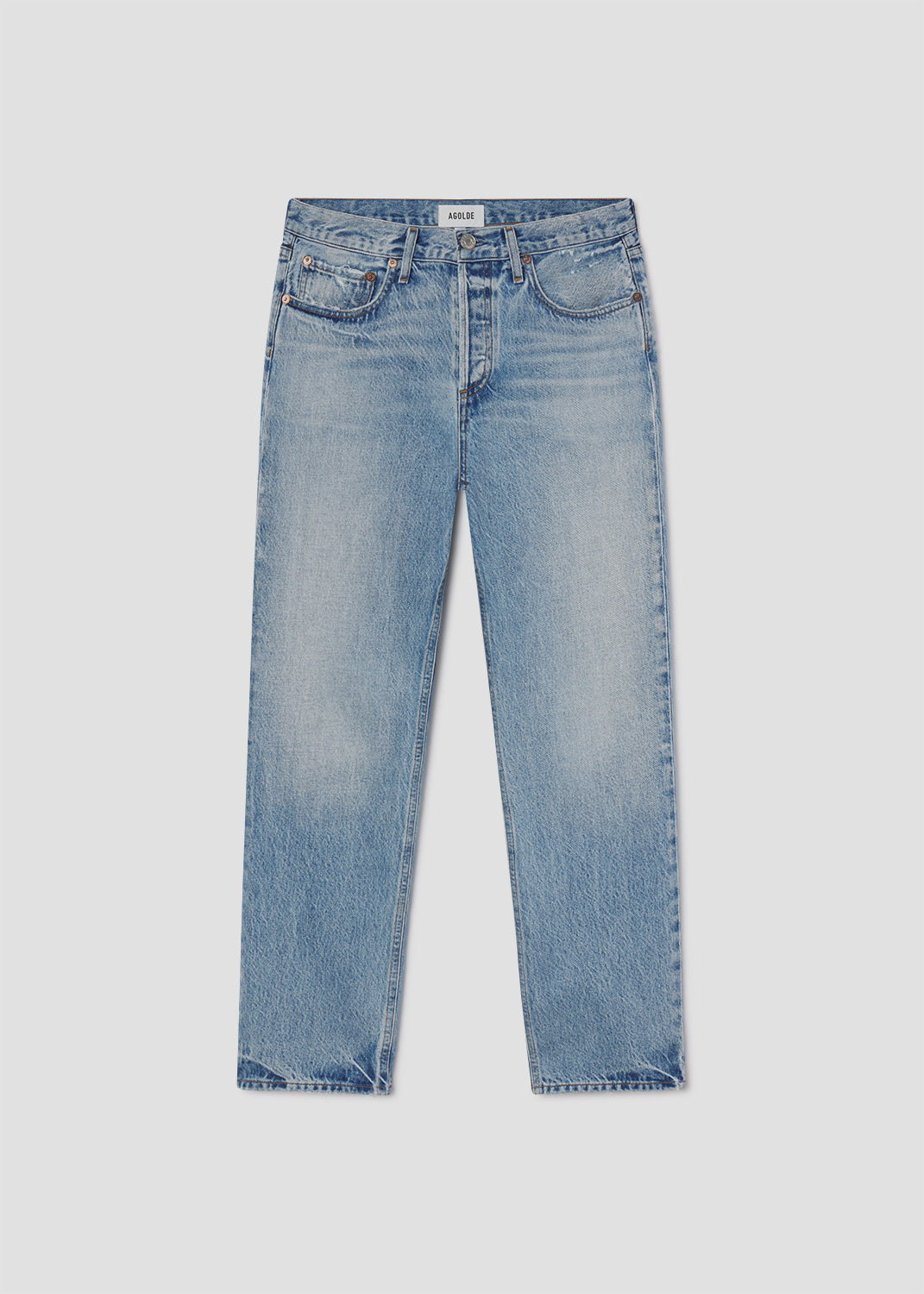 Blue jeans on a light gray background