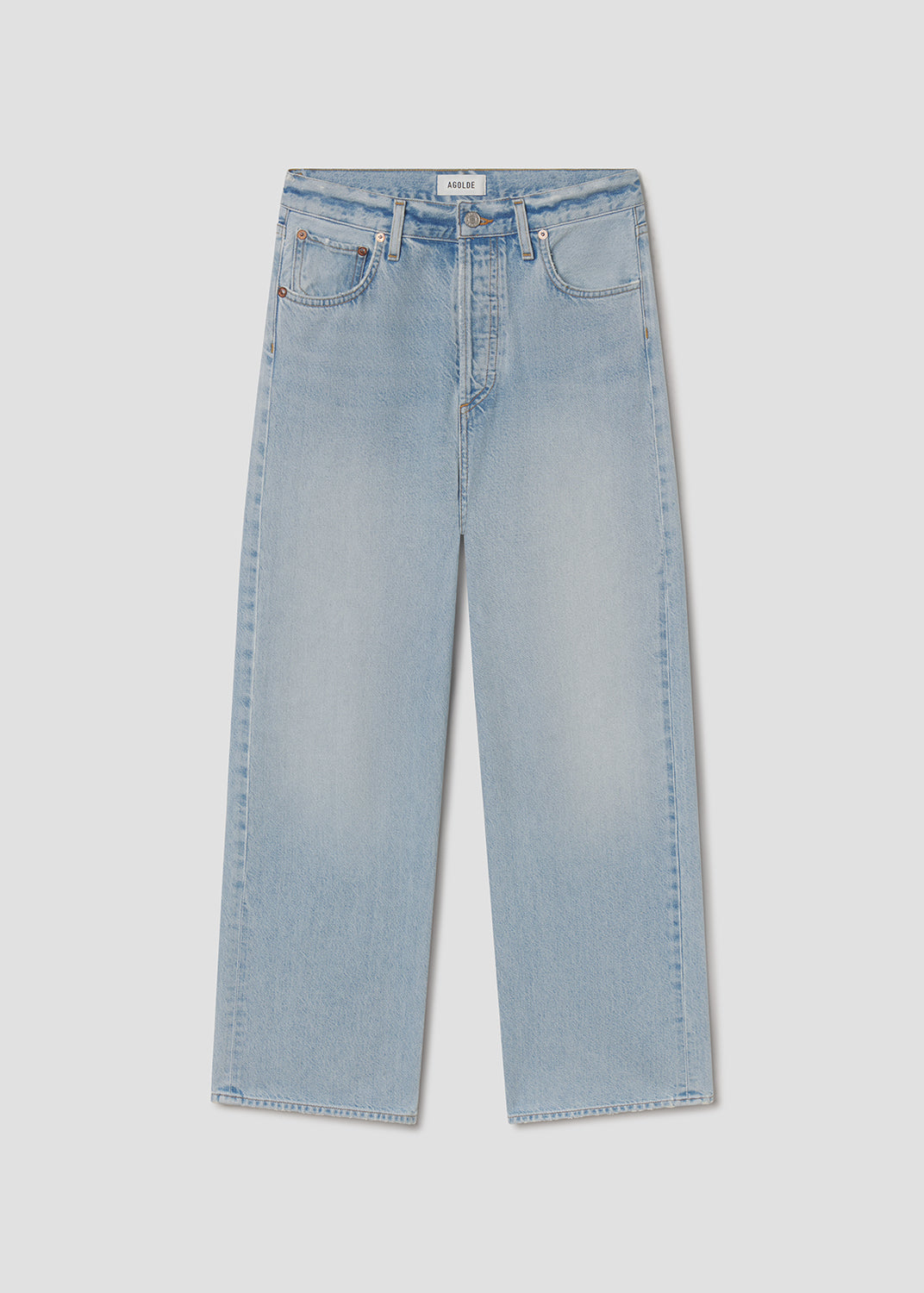 Light blue jeans on a light gray background