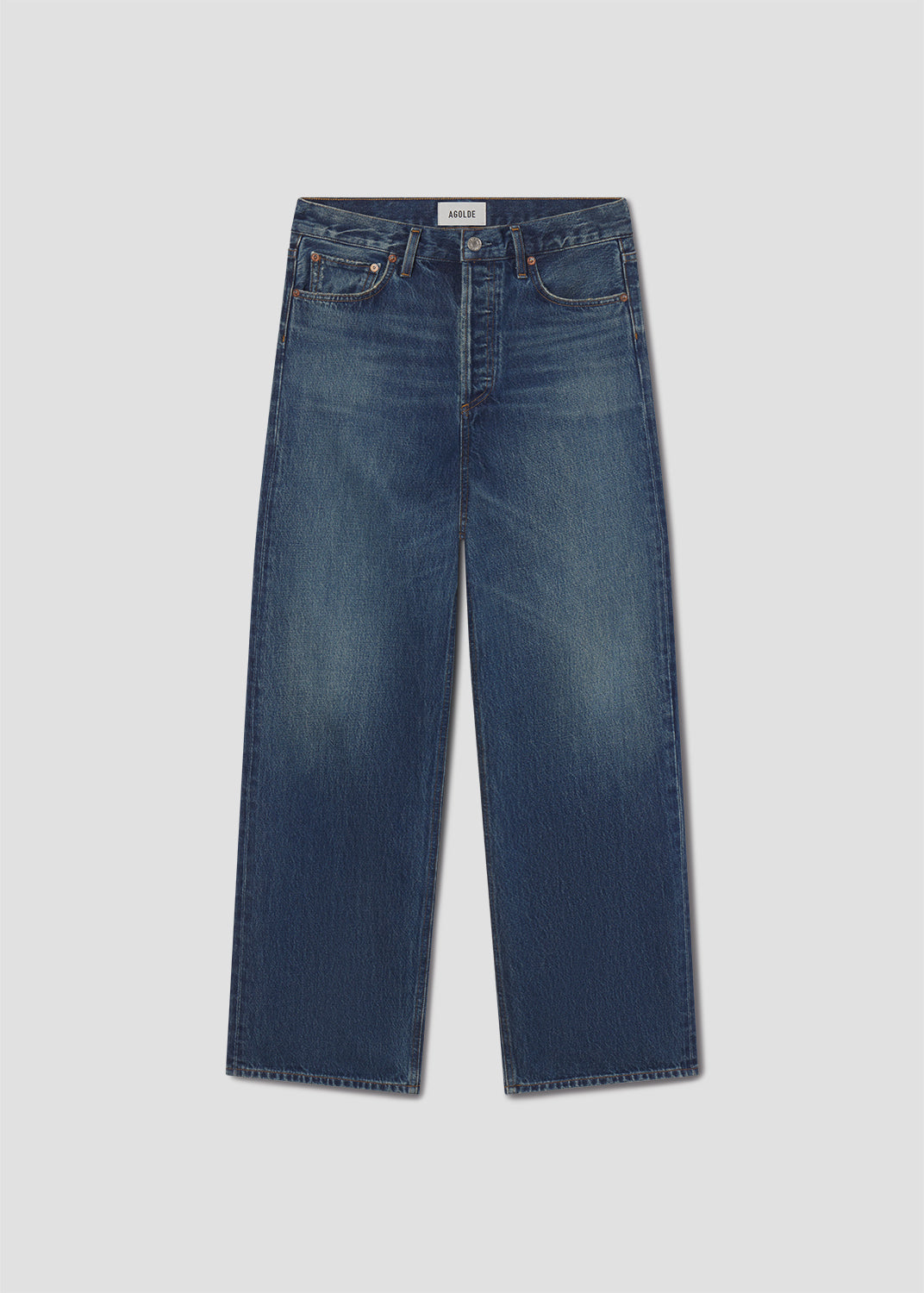 Blue jeans on a light gray background