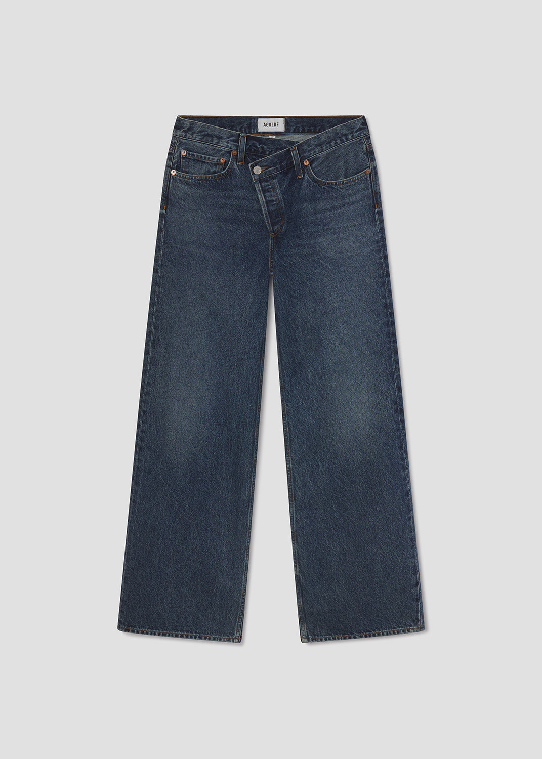Pair of blue jeans on a light gray background