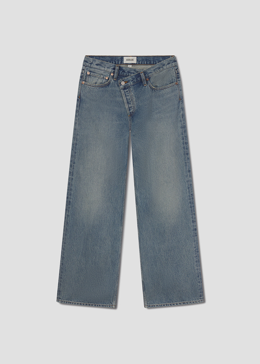 Blue jeans on a light gray background