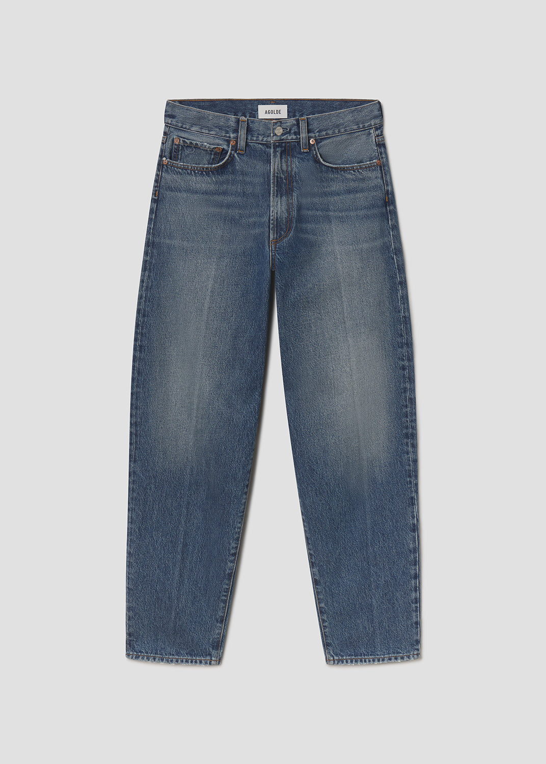 Blue jeans on a light gray background