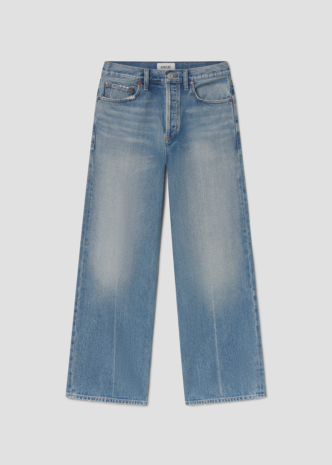 Blue jeans on a light gray background