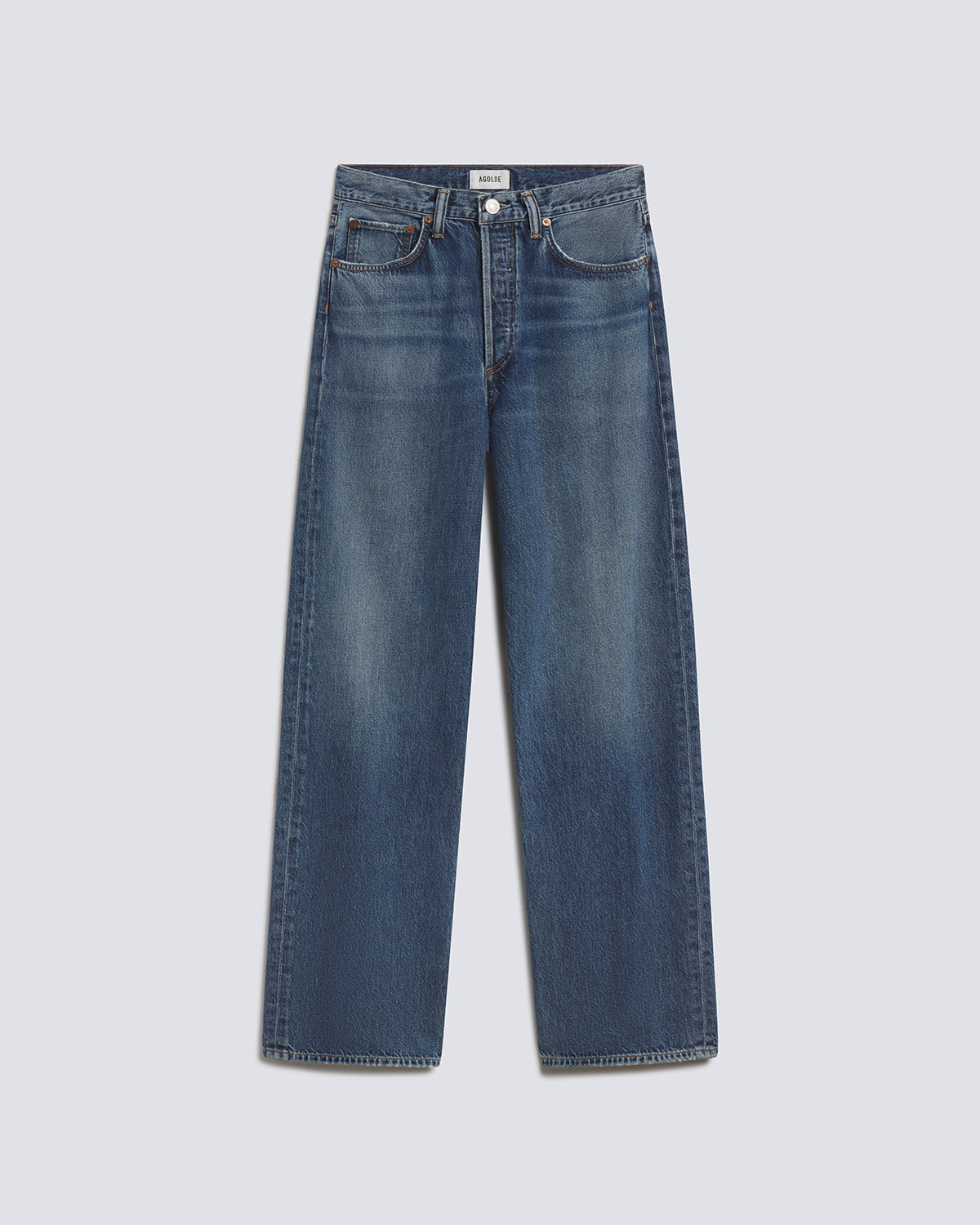 A pair of medium-wash blue denim jeans with a straight-leg fit, shown flat against a light gray background.