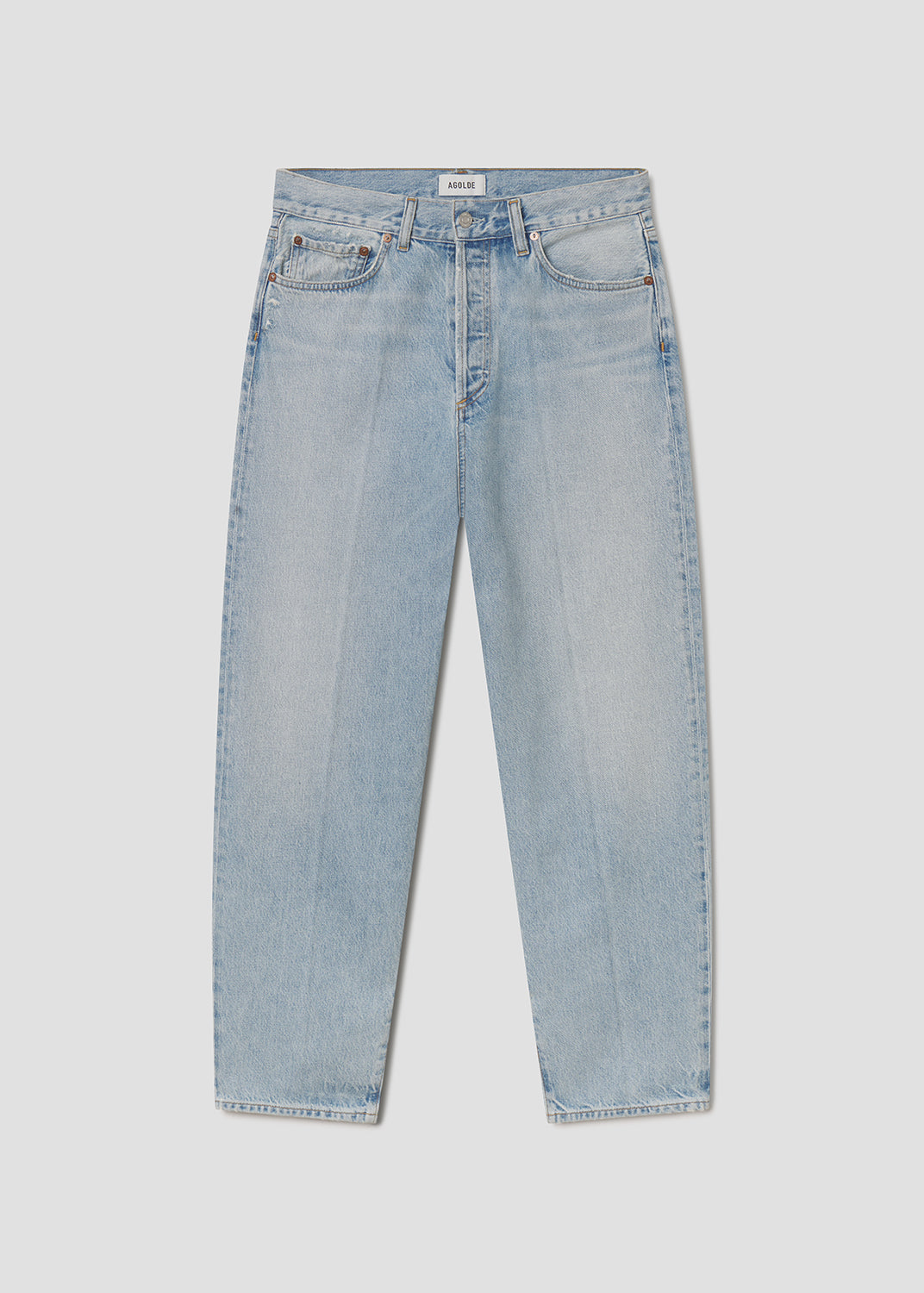 Light blue jeans on a light gray background