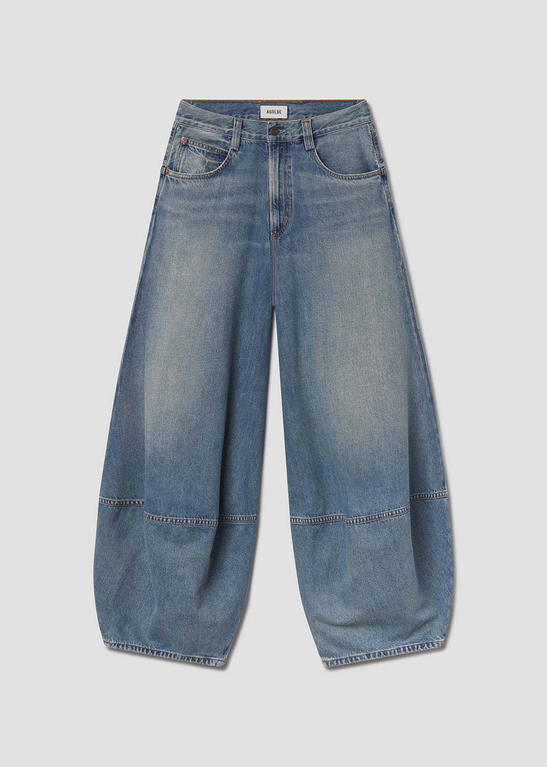Blue jeans on a light gray background