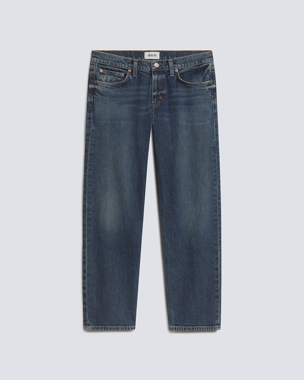 A pair of dark blue denim jeans with a straight-leg fit, shown flat against a light gray background.