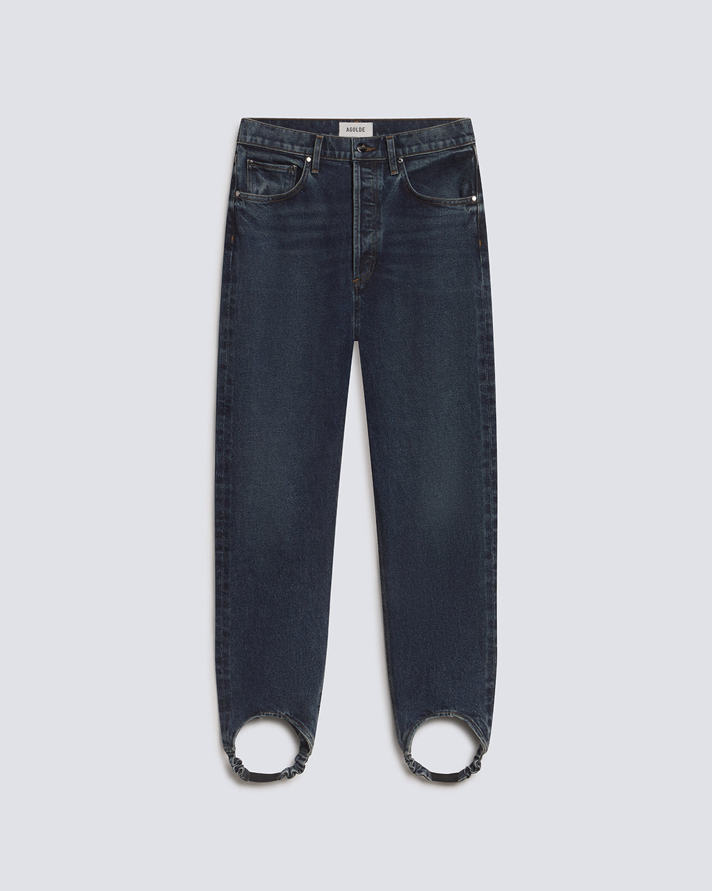 Dark blue denim jeans with circular cutouts at the ankles, displayed flat against a light gray background.