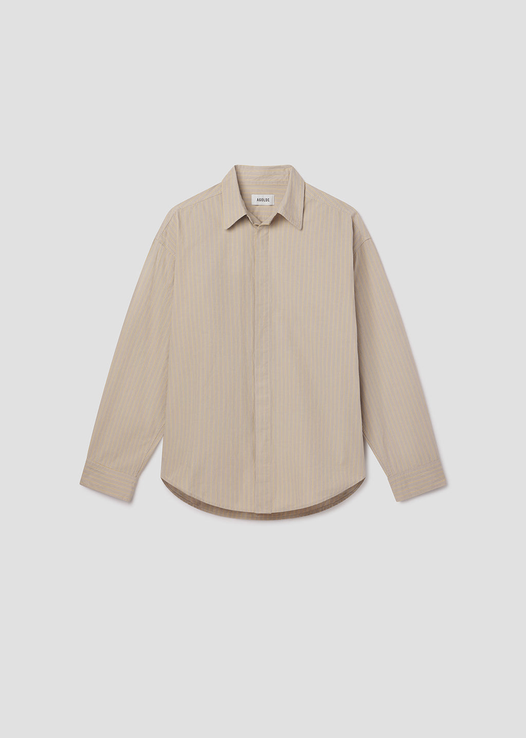 Beige striped shirt on a light gray background