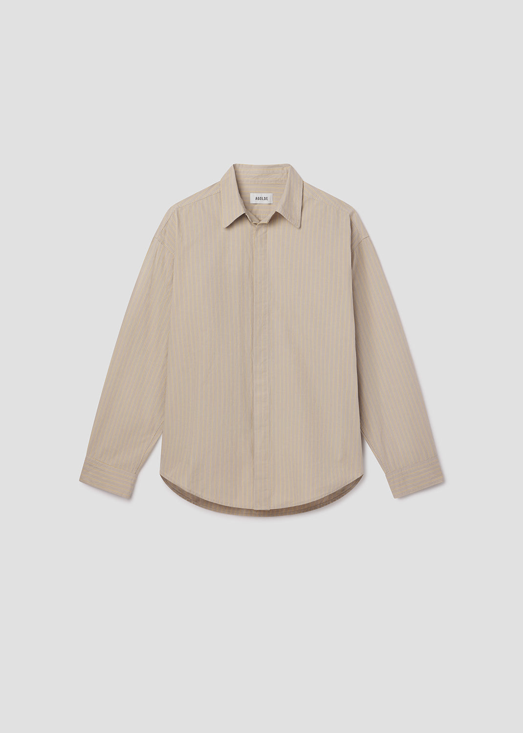 Beige striped shirt on a light gray background