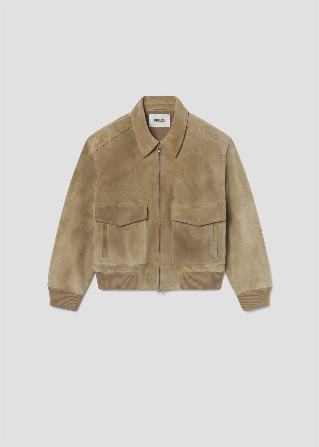 Beige suede jacket on a light gray background