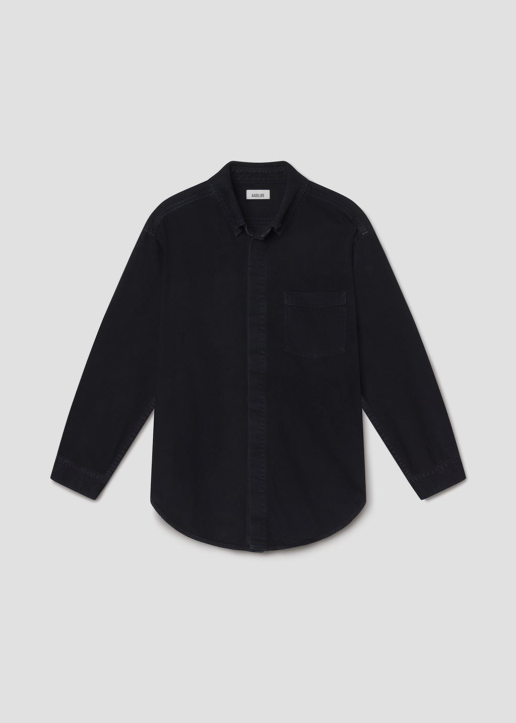 Black shirt on a grey background