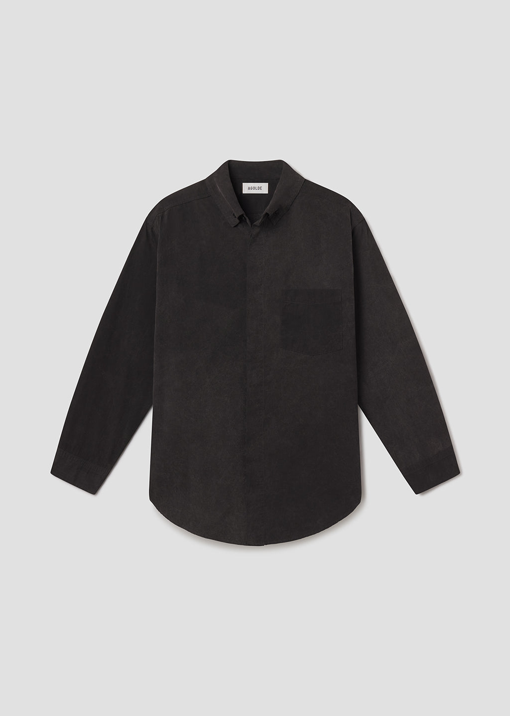 Flat lay shot of black shirt on a grey background