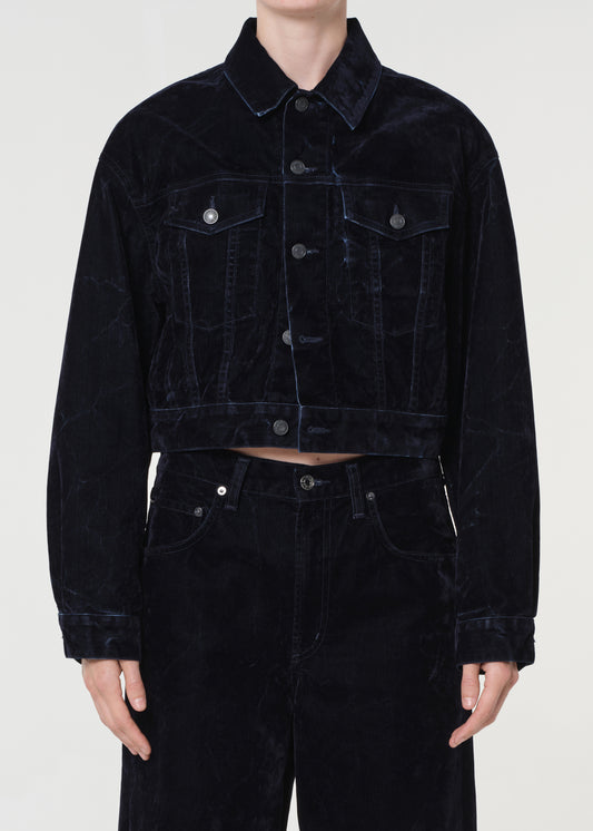 Blue corduroy jacket and pants on a white background