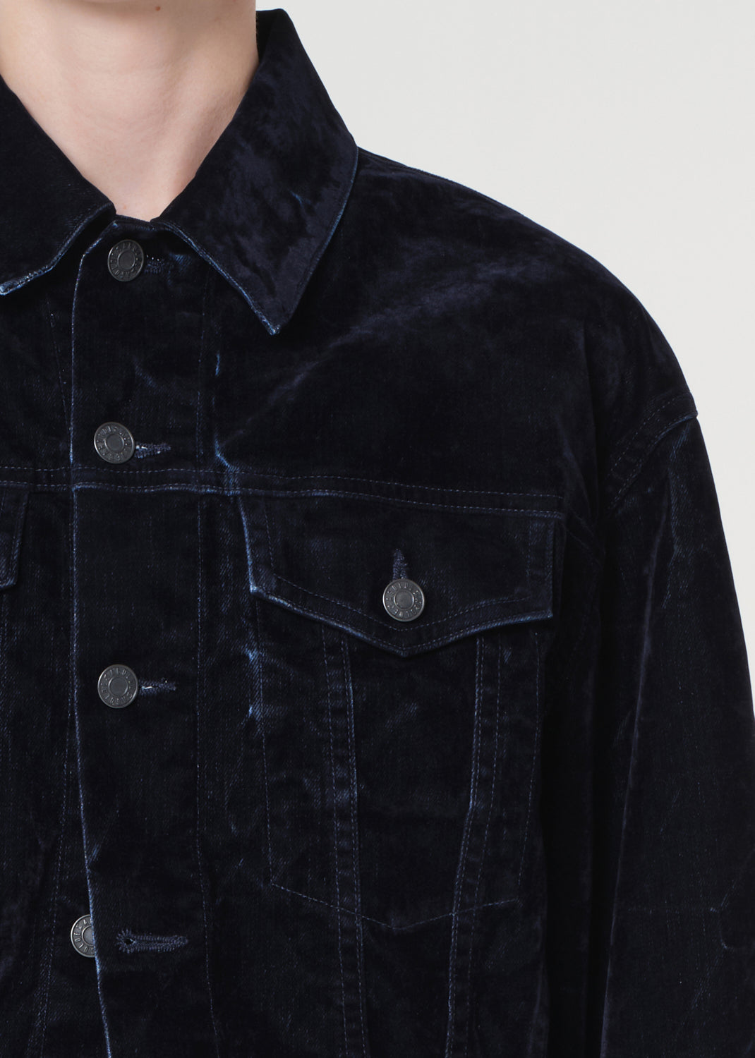 Blue corduroy jacket and pants on a white background