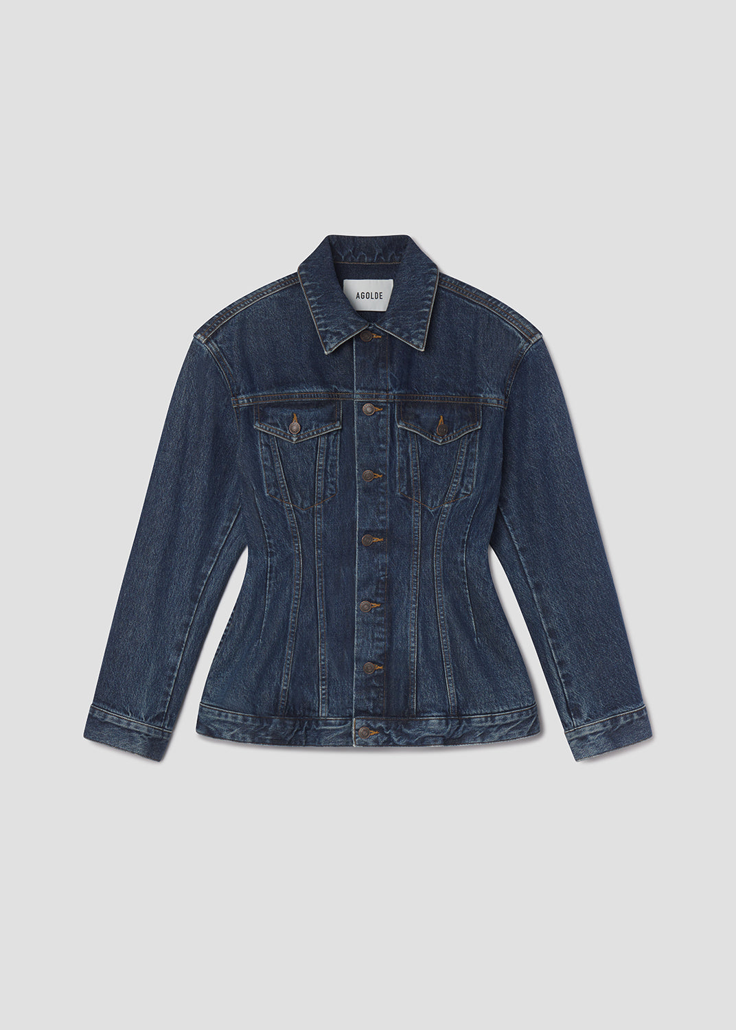 Blue denim jacket on a light gray background
