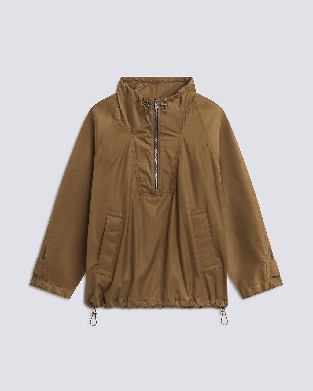 A brown lightweight anorak jacket with a half-zip collar, long sleeves, and drawstring hem, displayed on a light gray background.