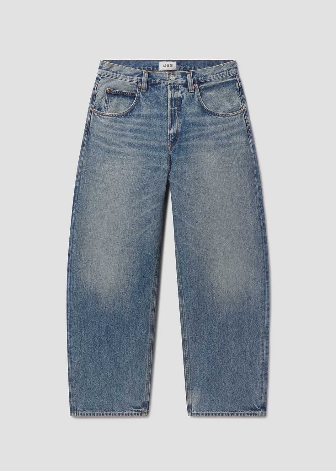 Blue jeans on a light gray background