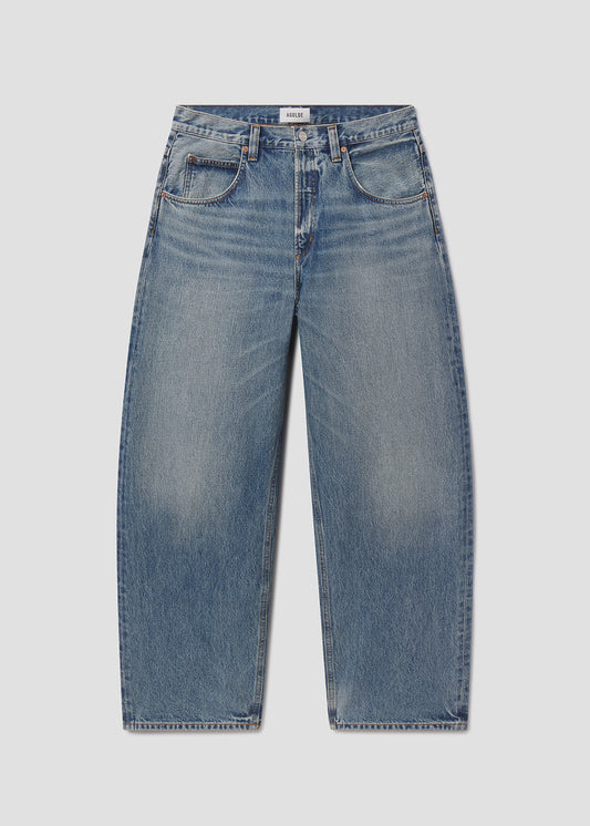 Blue jeans on a light gray background