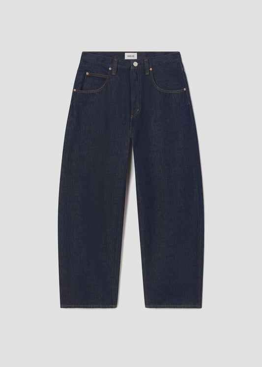 Dark blue jeans on a light gray background