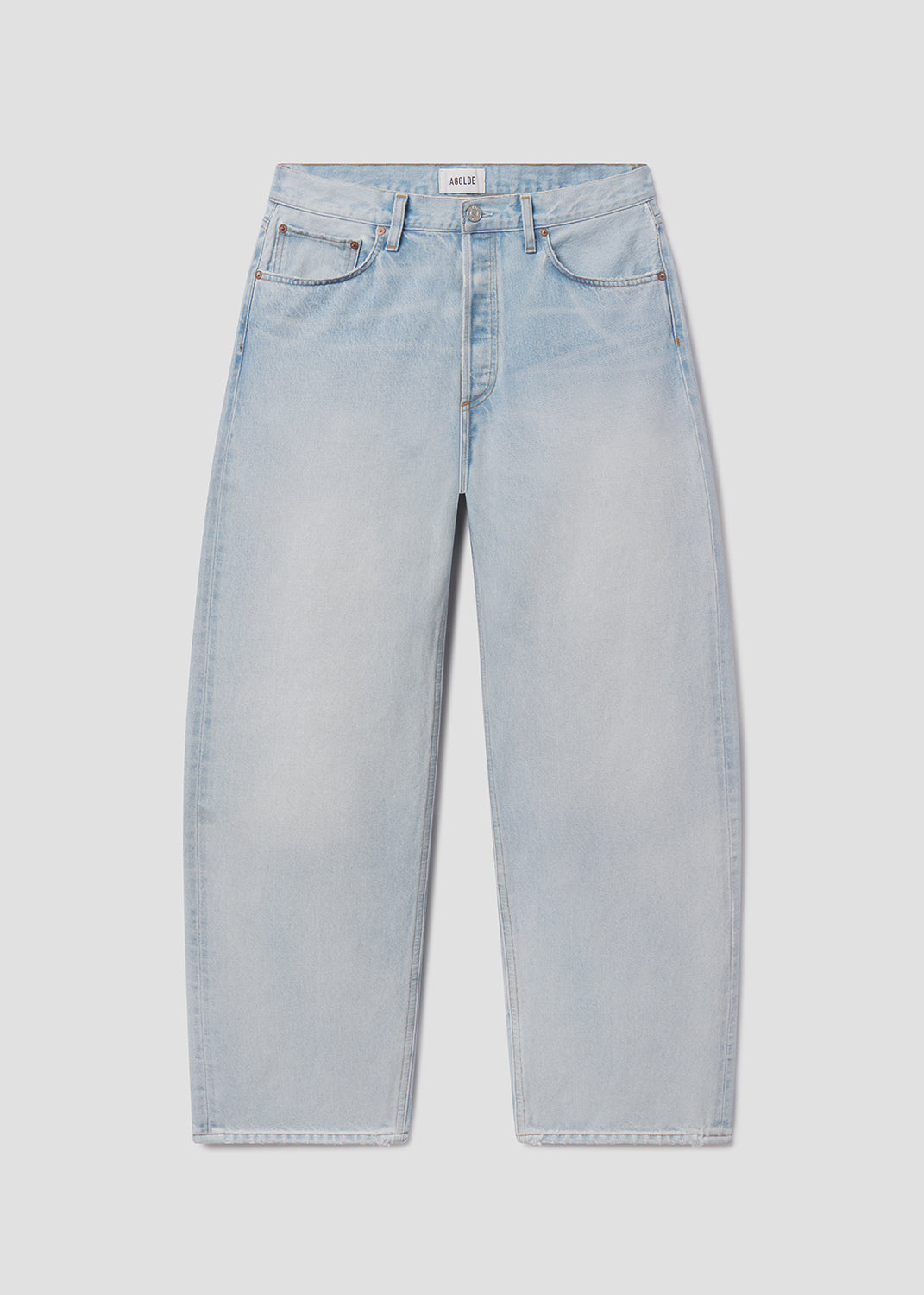 Light blue jeans on a light gray background