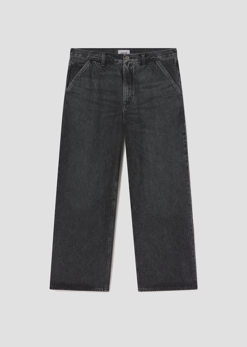 Black jeans on a light gray background