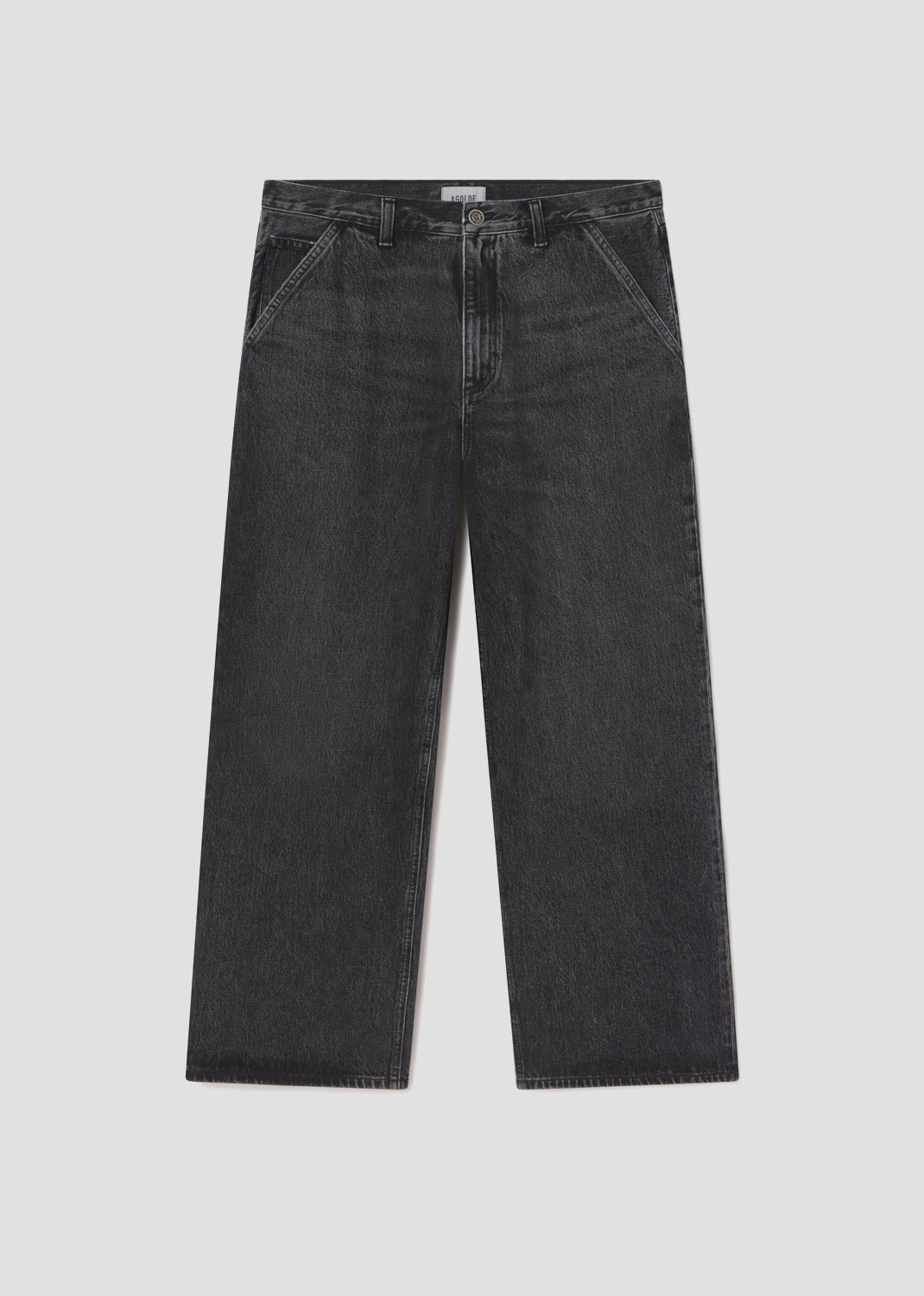 Black jeans on a light gray background