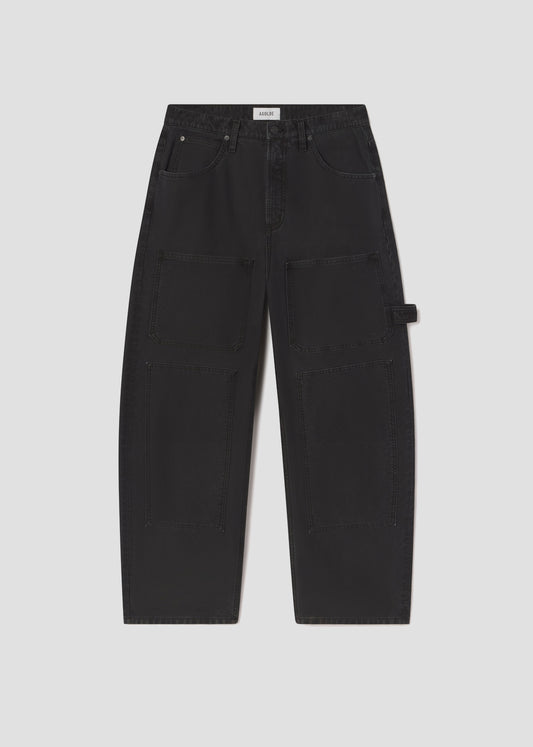 Black cargo pants on a light gray background
