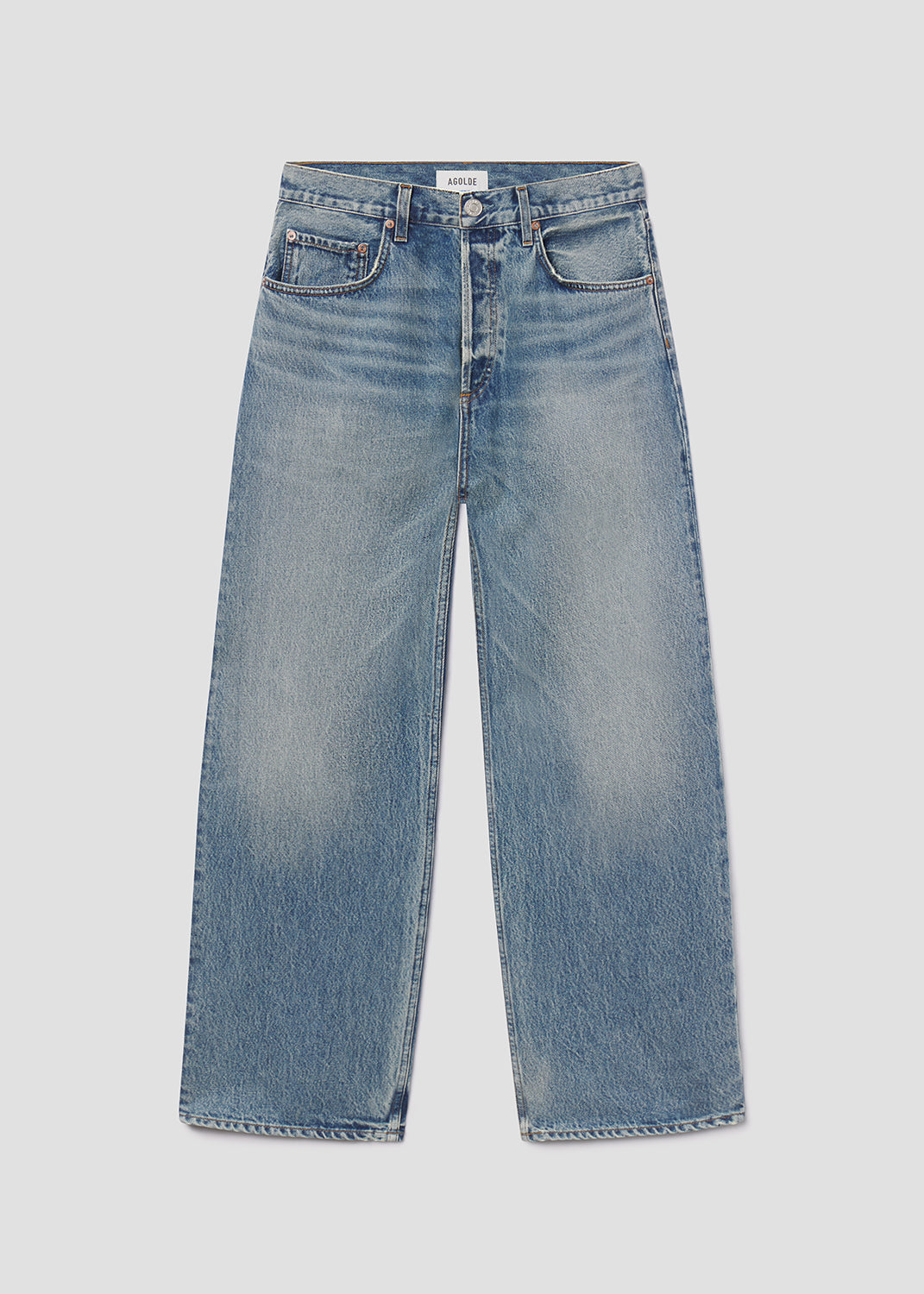 Blue jeans on a light gray background