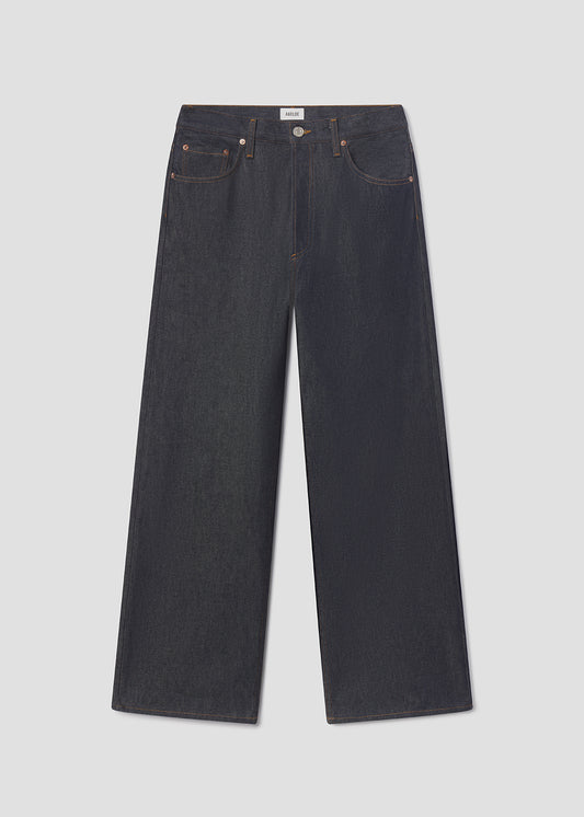 Dark blue jeans on a light gray background