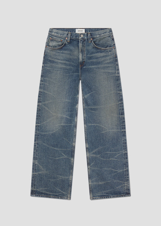 Blue jeans on a light gray background