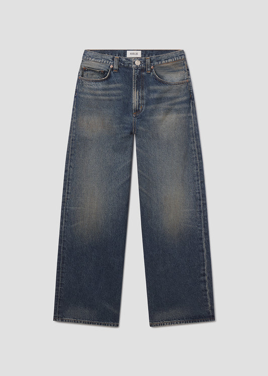 Flat lay shot of blue jean on grey background