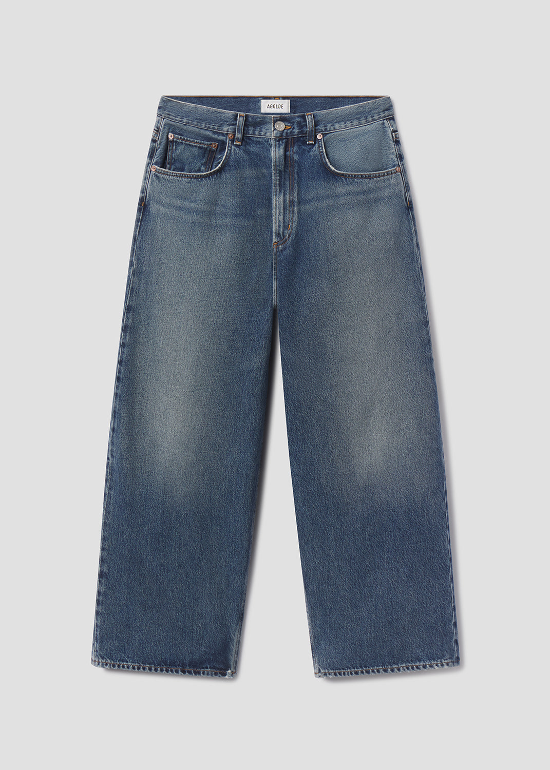 Blue jeans on a light gray background