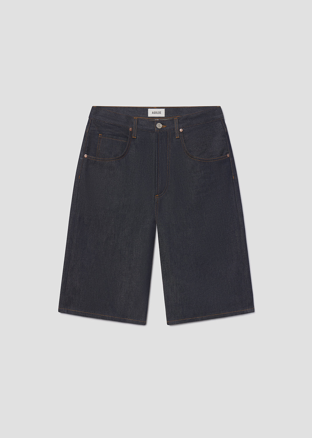 Dark blue denim shorts on a light gray background