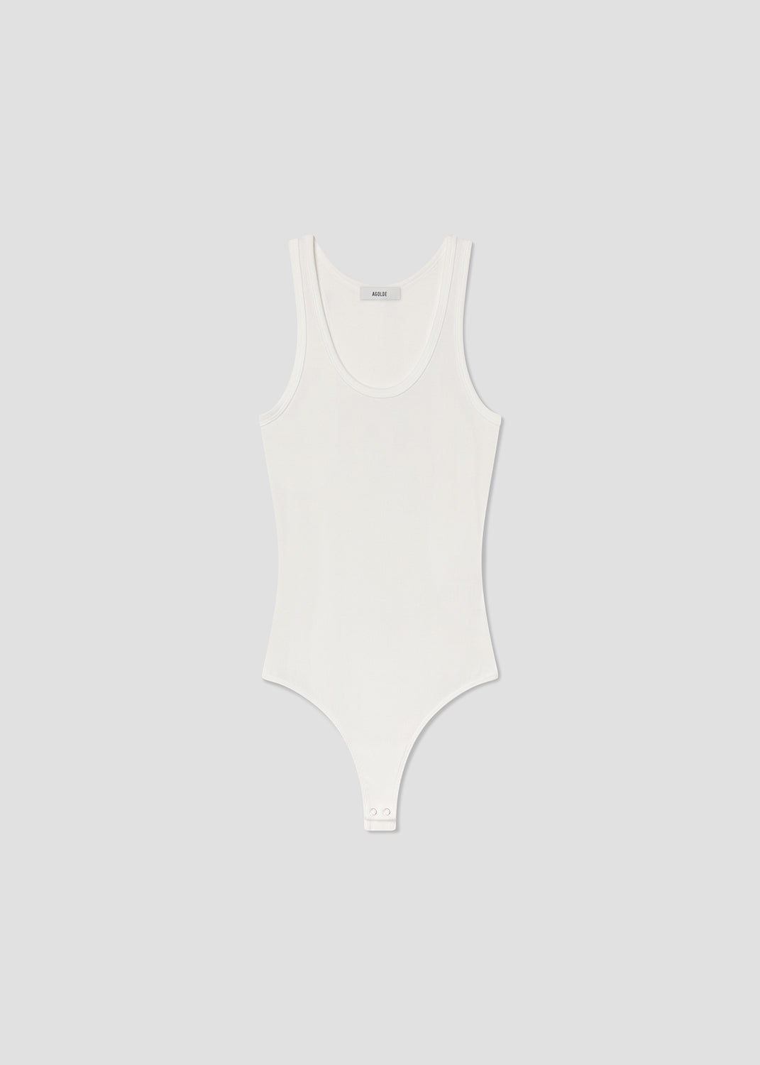 White swimsuit on a light gray background
