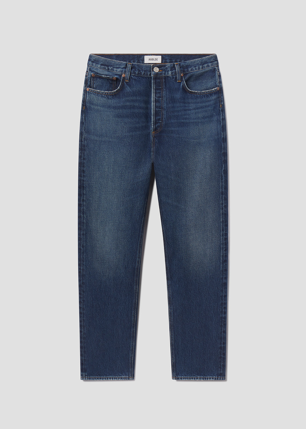 Blue jeans on a light gray background