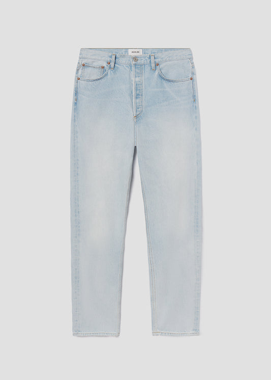 Light blue jeans on a light gray background