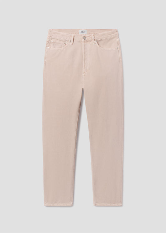 Beige pants on a light gray background