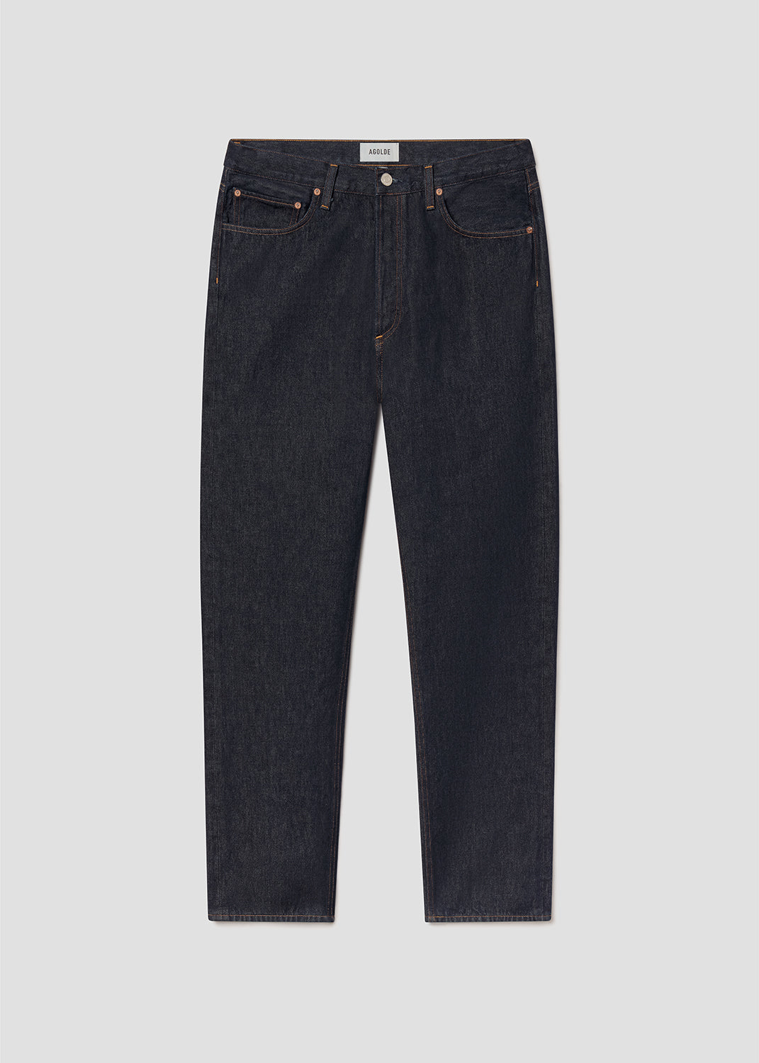 Dark blue jeans on a grey background