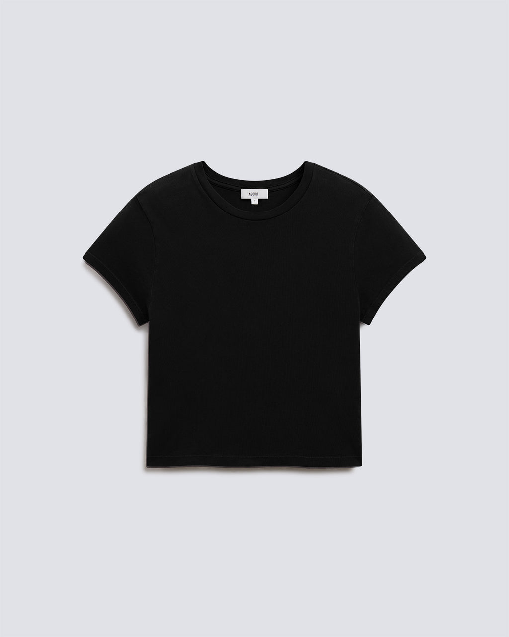 A black short-sleeve crewneck crop top laid flat against a light gray background.
