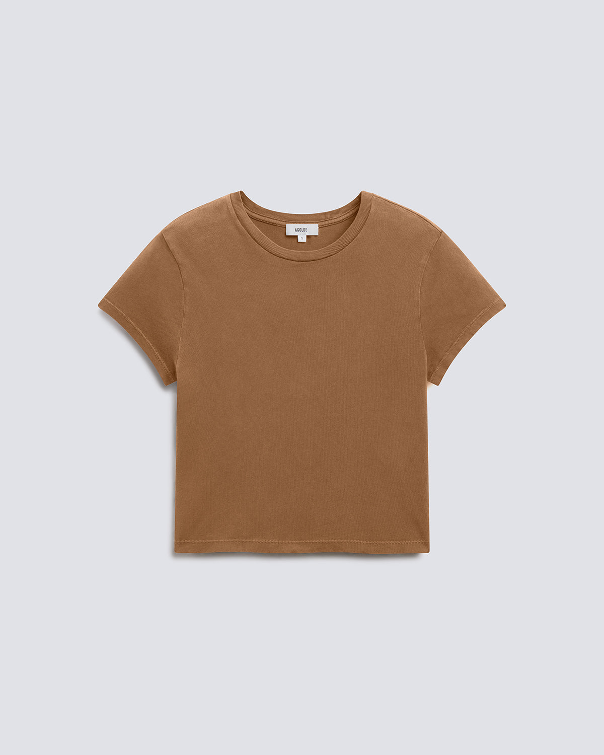 A cropped short-sleeve crewneck t-shirt in a warm brown color, displayed flat against a light gray background.