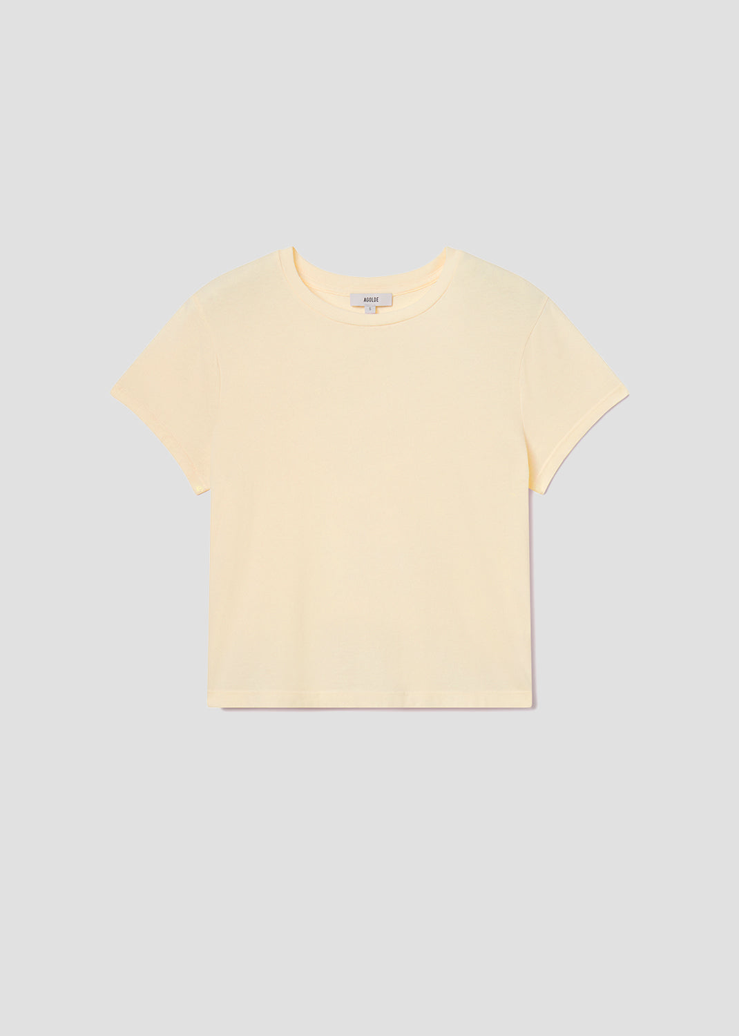 Yellow t-shirt on a light gray background