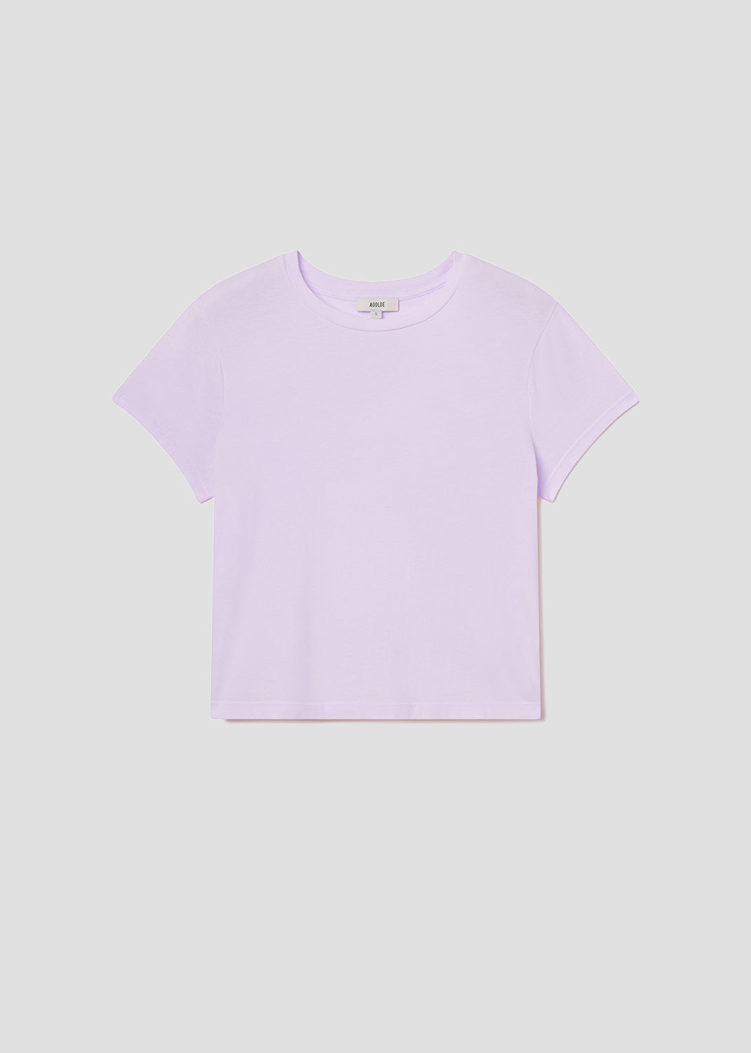 Lavender t-shirt on a light gray background