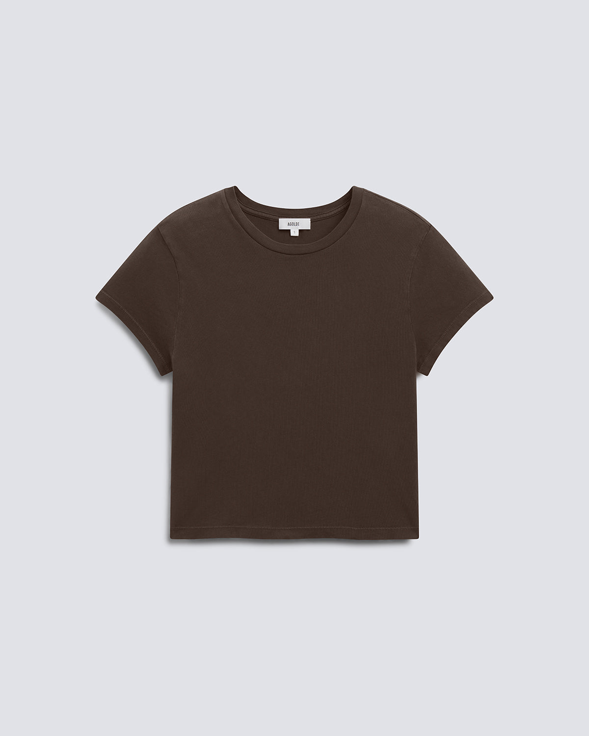 A dark brown short-sleeve crewneck crop top t-shirt, laid flat against a light gray background.